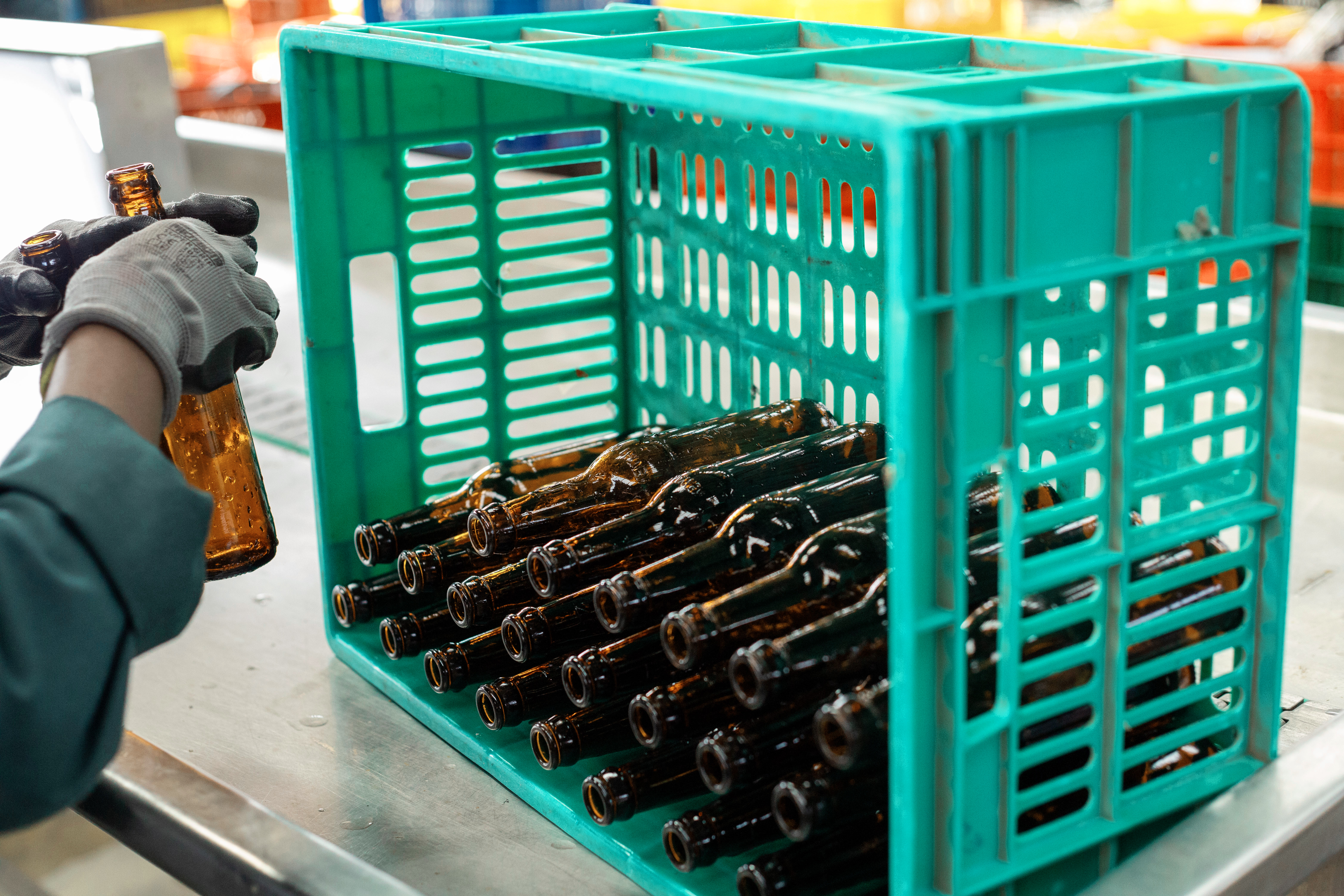 Sparkling clean glass bottles ready for reuse